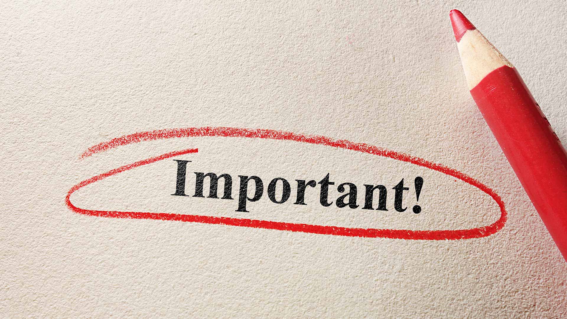 The word 'Important' circled in red pencil on a white piece of paper